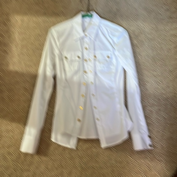 Cache Tops - COPY - Woman’s white blouse with gold snap buttons